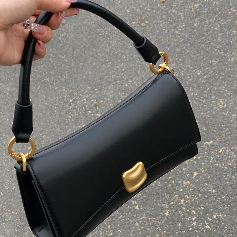 Black underarm baguette bag for women, 2026 new high-end texture niche handbag, popular crossbody bag this year